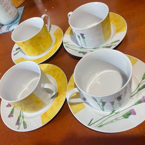 Porcelain serving set with 4 glasses and saucers like new