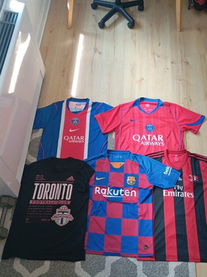 Set of 5 football jerseys including PSG, AC Milan, Barcelona, Toronto FC