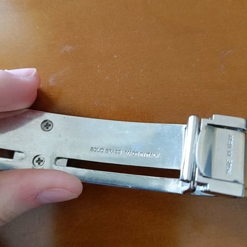 Brown Italian belt used, adjustable with silver buckle