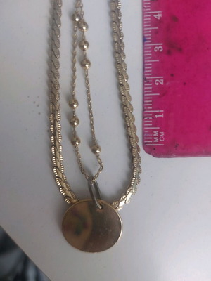 Double gold necklace like new, gold-plated stainless steel with round design