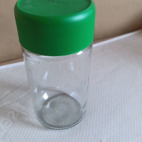 Large glass jar used with plastic lid and two spouts