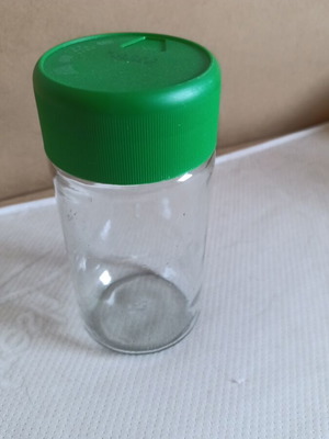 Large glass jar used with plastic lid and two spouts