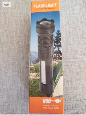 LED flashlight with 7 lighting modes and micro USB cable new