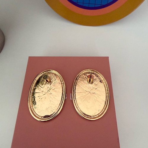 Marks & Spencer oval earrings like new, gold animal print pattern