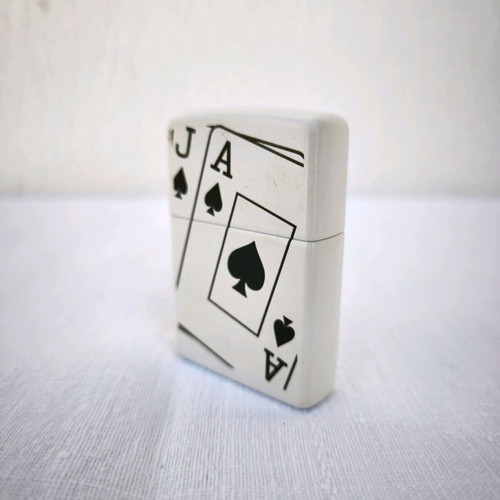 Zippo lighter with playing card design, like new