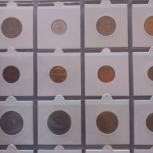 World coin lot used, 100 different coins in soft album