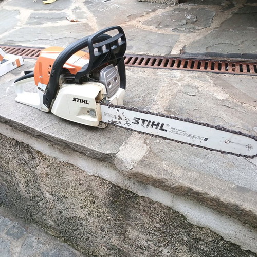 Stihl MS 251 chainsaw like new with three chains