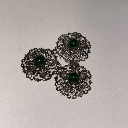 Vintage metal dress buckle with triple filigree design and green stones, like new