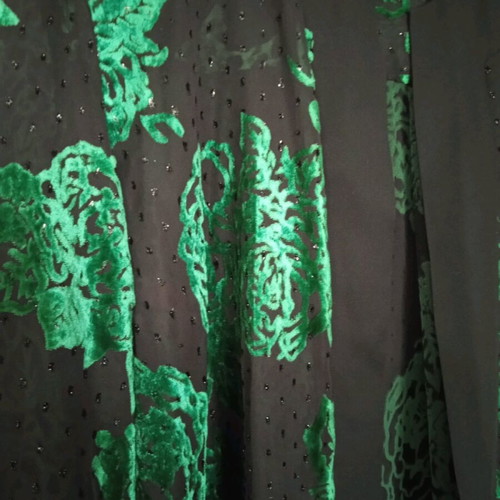 Women's tunic like new, black with green flowers
