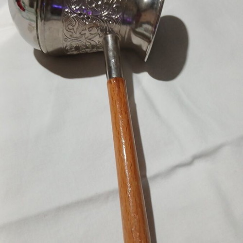 Traditional copper briki with embossed designs and wooden handle, like new