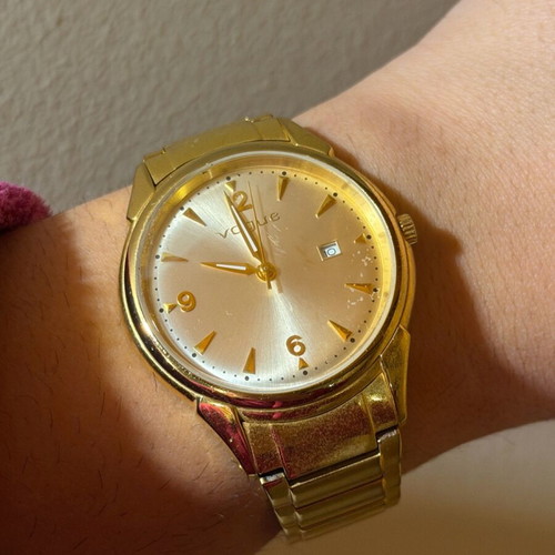 Vogue watch used, gold color with scratches