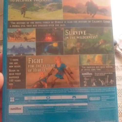 Wii U games Zelda Breath of the Wild and Batman Arkham City used