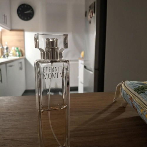 Calvin Klein Eternity Moment perfume used, visible level