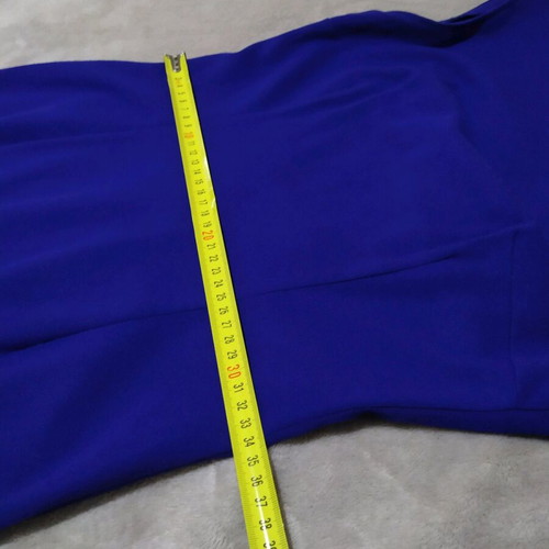 blue dress with an opening at the back