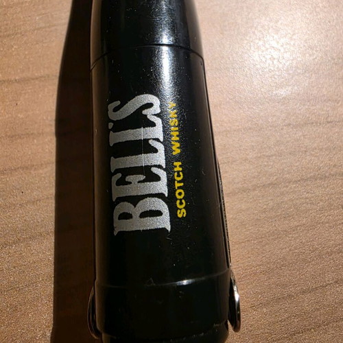 Vintage bottle opener in the shape of a wine bottle like new