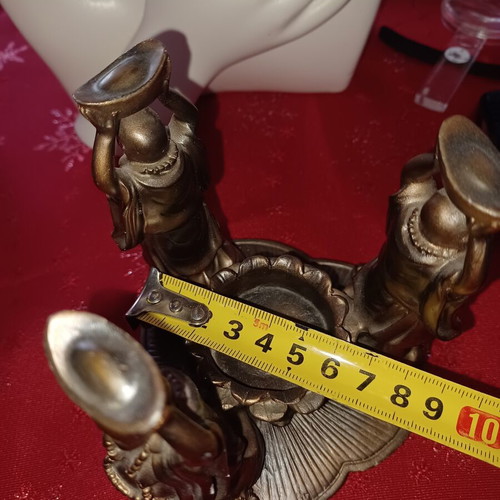 Asian candlestick with 3 smiling figures used, bronze finish
