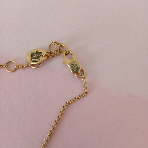 Juicy Couture necklace used with pearl and brand name