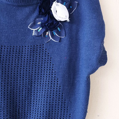 Made in Love sleeveless blue sweater with decorative flower