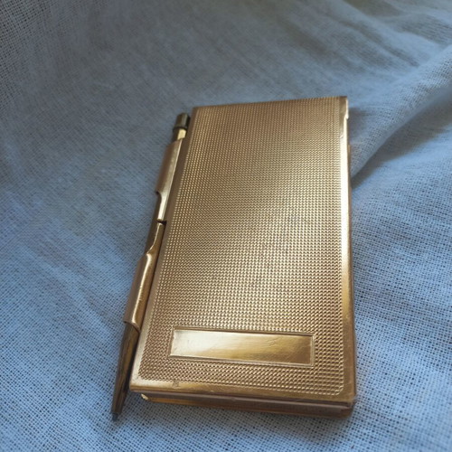 Vintage luxury set with metal notebook and travel shaving case used