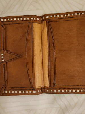 Leather wallet used for documents and banknotes brown