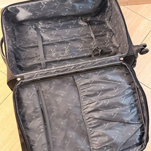 Large wheeled travel suitcase like new, black