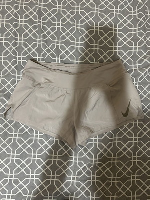 Nike running shorts for women, beige pink, size M