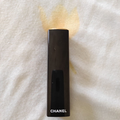 Chanel and Clinique lipsticks used, set of two
