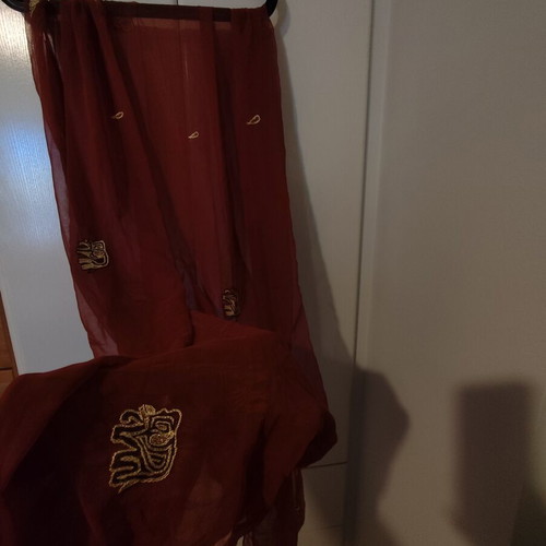 Long brown scarf used with embroidered elephants and paisley