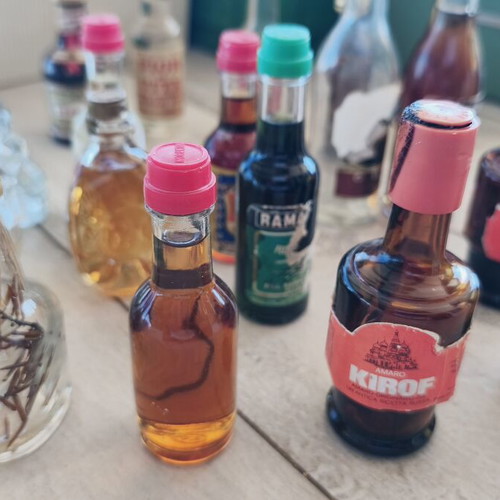 Miniature liquor bottles used, set of 21
