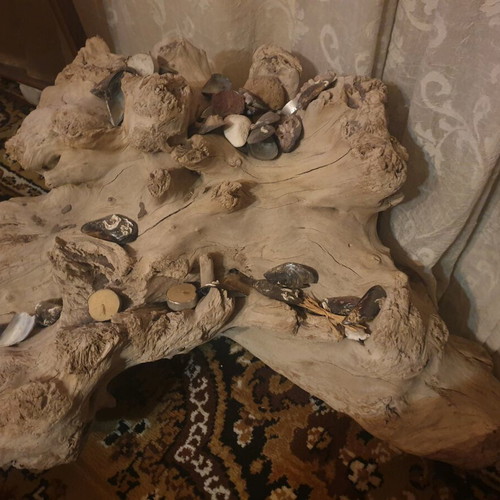 Decorative piece from natural wood root used with rustic character