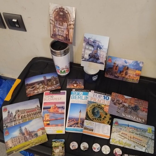 Travel memorabilia collection like new with books, magnets, cup, thermos, postcards, map