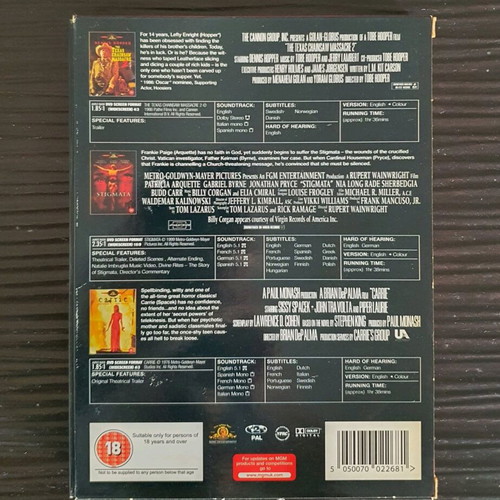 Essential Horror Collection Box Set used DVD with The Texas Chainsaw Massacre 2, Stigmata, Carrie
