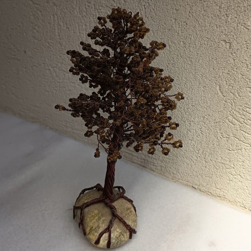 Handmade decorative tree with copper wire and beads on stone base