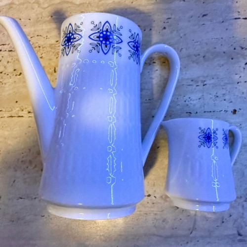 Vintage coffee/tea pot and creamer with blue floral design like new