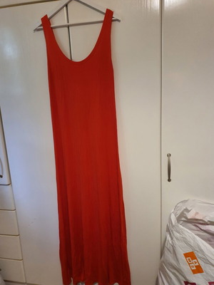 Red long dress like new with open back and gold cord tie