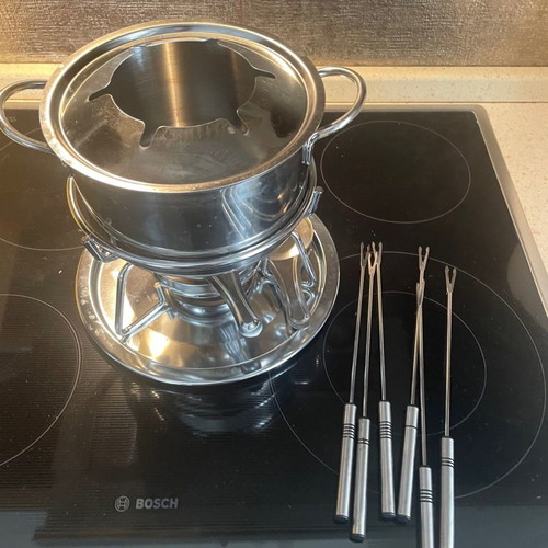 Fondue set used with 6 forks