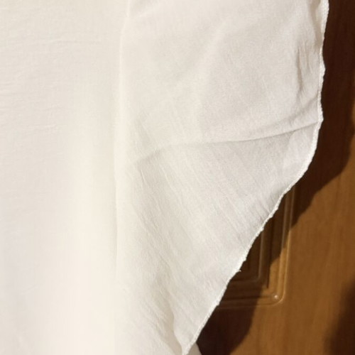 White airy blouse with V neckline and ruffle sleeves, like new, size L/XL