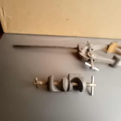 Old laboratory tools used for holding test tubes and bottles