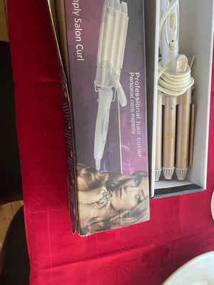 Hair curler used with three barrels for wavy curls