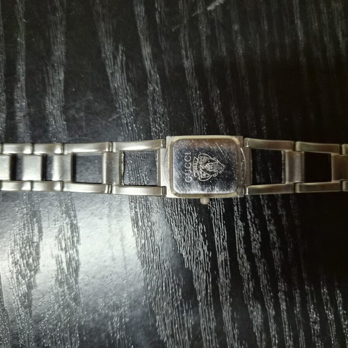 Gucci women's wristwatch, white and silver