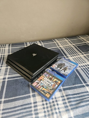 PlayStation 4 Pro 1TB console like new with controller and games