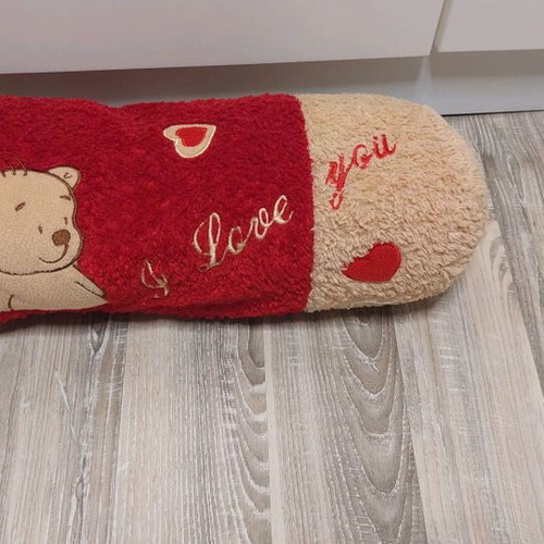 Decorative pillow used, approximately 13×45 cm