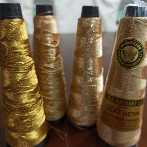 Au Papillon Embroidery Gold Threads, like new, 4 cones