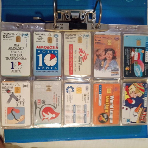 Phone cards used, collection of 240 in special sleeves with binder