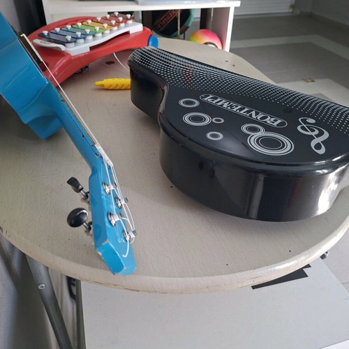 Musical children's instruments used, red one not working well
