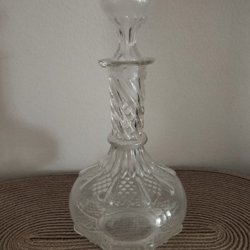 Carafe antique glass with decorative designs and original stopper, used