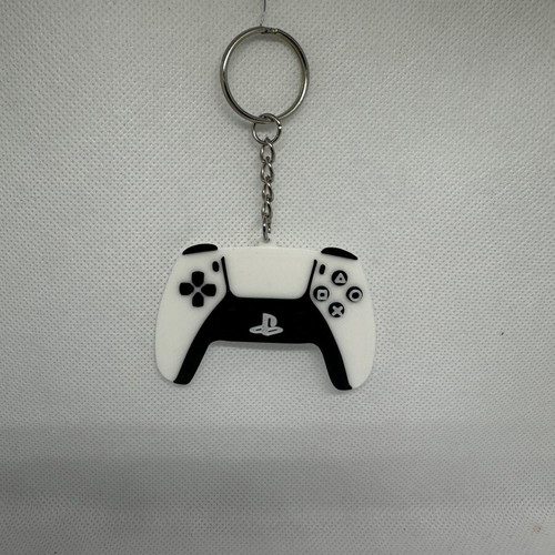 Dualsense PS5 keychain like new, black and white