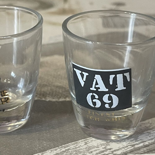 Whiskey Shot Glasses set of 4 like new, collectible labels