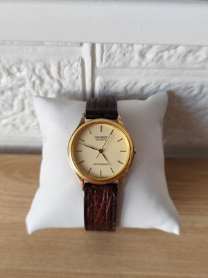 Orient vintage quartz ρολόι μεταχειρισμένο, χρυσαφί κάσα, καφέ δερμάτινο λουράκι