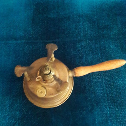 Vintage brass gas burner used with slight base deformation